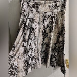 Wide band snake skin skirt